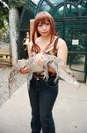  1girl brown_hair chouzuki_maryou cosplay crocodile crocodilian dead_or_alive hitomi_(doa) hitomi_(doa)_(cosplay) photo 