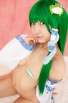  1girl asian cosplay detached_sleeves female green_hair highres kneeling kochiya_sanae kochiya_sanae_(cosplay) lenfried lenfriend nude photo solo touhou 