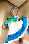  apron bed blue_dress bow cosplay dress female highres izayoi_sakuya lenfried photo ribbon silver_hair solo touhou 