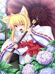  :d animal_ear_fluff animal_ears blonde_hair blush flower fox_ears hakama_skirt highres hydrangea japanese_clothes miko one_eye_closed open_mouth oriental_umbrella original red_eyes roshin smile solo umbrella water_drop 