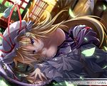  bare_shoulders blonde_hair breasts cleavage long_hair lying medium_breasts mirror off_shoulder on_stomach purple_eyes reflection rondo_umigame solo touhou yakumo_yukari 