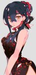  1girl alternate_hairstyle bare_shoulders black_dress black_hair carmine_(pokemon) china_dress chinese_clothes closed_mouth colored_inner_hair crossed_bangs dress eyelashes hair_between_eyes hair_bun hair_up highres kawasaki_(kwsk_8765) long_hair looking_at_viewer mole mole_under_eye multicolored_hair pokemon pokemon_sv print_dress red_hair side_slit simple_background sleeveless sleeveless_dress solo two-tone_hair yellow_eyes 