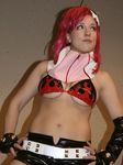  bikini_top breasts cosplay gloves highres large_breasts long_hair photo red_hair short_shorts shorts solo tengen_toppa_gurren_lagann thighhighs underboob yoko_littner 