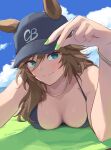  1girl animal_ears artist_name bare_shoulders baseball_cap black_hat black_tank_top blue_eyes blue_sky blush breasts cleavage closed_mouth cloud cloudy_sky commentary_request ears_through_headwear grass green_nails hat highres horse_ears horse_girl looking_at_viewer lying medium_breasts mr._c.b._(umamusume) mukakin on_stomach outdoors sky smile solo tank_top umamusume 