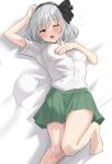  1girl ;o absurdres arm_up bare_legs barefoot bed_sheet black_bow black_hairband blue_eyes blush bow bow_hairband breasts collared_shirt commentary ghost green_skirt grey_hair hair_between_eyes hairband hand_on_own_chest highres knee_up konpaku_youmu konpaku_youmu_(ghost) lying medium_breasts medium_hair on_back on_bed one_eye_closed partially_unbuttoned pleated_skirt shirt shirt_tucked_in short_sleeves sidelocks skirt speech_bubble touhou translated white_shirt youmu-kun 
