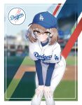  1girl alternate_costume baseball_cap baseball_field baseball_stadium baseball_uniform belt belt_buckle black_streaks blue_belt blue_hat blue_undershirt blurry blurry_background blush border breasts brown_eyes brown_hair buckle closed_mouth commentary crossed_bangs double-parted_bangs english_commentary fingernails hair_between_eyes hands_on_own_knees hat highres hololive hololive_english layered_sleeves leaning_forward long_sleeves looking_at_viewer los_angeles_dodgers mayoa multicolored_hair nanashi_mumei outside_border pants shirt short_hair short_over_long_sleeves short_sleeves smile solo sportswear streaked_hair textless_version virtual_youtuber white_border white_pants white_shirt white_streaks 