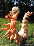  blonde_hair doll frown grass hair jon_beinart leaf multi_limb multiple_arms nightmare_fuel nude open_mouth outside raised_arm short_hair solo toy web_address what what_has_science_done 