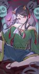  1girl absurdres bad_id bad_pixiv_id bare_shoulders blue_shorts blush brown_hair closed_mouth colored_inner_hair commentary_request cone_horns flip-flops green_shirt highres horn_ornament horn_ribbon horns long_hair long_sleeves looking_at_viewer multicolored_hair nippaku_zanmu off-shoulder_shirt off_shoulder red_eyes ribbon ribbon-trimmed_shirt ribbon-trimmed_shorts ribbon-trimmed_sleeves ribbon_trim sandals shirt shorts skull smile solo suzukiairi0001 toes touhou yellow_horns 