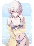  1girl absurdres asumi_sena asumi_sena_(vspo!_summer_2024) bikini blush bracelet braid breasts chain chain_necklace cleavage closed_mouth commentary embarrassed grey_bikini grey_hair hand_on_own_arm heart heart_o-ring highres jacket jewelry medium_breasts multicolored_hair necklace o-ring ocean off_shoulder pink_hair solo standing streaked_hair swimsuit tama_3355 two-tone_hair untranslatable_commentary virtual_youtuber vspo! yellow_jacket 