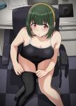  1girl adjusting_clothes adjusting_legwear black_one-piece_swimsuit black_thighhighs blush breasts chair commentary_request from_above green_hair hairband headset highres idolmaster idolmaster_(classic) indoors large_breasts looking_at_viewer mole mole_under_mouth on_chair one-piece_swimsuit otonashi_kotori red_eyes short_hair single_bare_leg single_thighhigh sitting solo swimsuit swivel_chair thighhighs tsurui yellow_hairband 