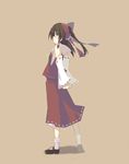  arms_behind_back brown_eyes brown_hair chig detached_sleeves hair_ribbon hakurei_reimu ribbon solo touhou 