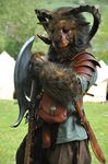  axe beastman forest fursuit horn larp photo pouch real shortsword tent tree weapon wood 