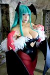  1girl aqua_hair asian blue_eyes breasts capcom chouzuki_maryou cleavage cosplay highres large_breasts morrigan_aensland morrigan_aensland_(cosplay) photo plump solo thick_thighs thighs vampire_(game) 