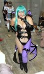  1girl aqua_hair asian bat_wings blue_eyes breasts capcom chouzuki_maryou cleavage cosplay demon_girl head_wings large_breasts monster_girl morrigan_aensland morrigan_aensland_(cosplay) photo plump solo succubus thick_thighs thighs vampire_(game) wide_hips wings 