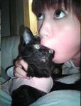  1girl black_cat cat japanese lowres nakagawa_shoko oral photo what 