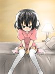  animal_ears bed black_eyes black_hair blush bunny_ears carrot carrot_necklace condom condom_in_mouth desk dress inaba_tewi jewelry keishiki_(leftwin) lamp looking_at_viewer mouth_hold necklace on_bed pendant short_hair sitting solo thighhighs tissue_box touhou v_arms white_legwear 