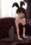  1girl alternate_costume animal_ears bare_shoulders black_leotard bow bowtie brown_eyes brown_hair bunny_ears bunny_girl bunny_tail bunnysuit couch detached_collar fake_animal_ears fuyube_gin_(huyube) hairband highres indoors kaga_(kantai_collection) kantai_collection leotard looking_at_viewer on_couch pantyhose side_ponytail solo strapless strapless_leotard tail wrist_cuffs 