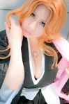  bleach breasts cosplay jewelry long_hair mastumoto_rangiku matsumoto_rangiku necklace orange_hair photo 