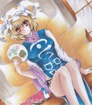  blonde_hair breasts brown_eyes chen chen_(cat) fan food fox_tail fruit hat medium_breasts multiple_tails paper_fan ryumaira short_hair sitting smile solo tail touhou traditional_media uchiwa watermelon yakumo_ran 