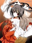  black_hair copyright_request fan folding_fan hakama highres japanese_clothes long_hair miko miyashita_miki orange_eyes red_hakama solo 