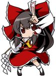  brown_eyes brown_hair chibi gohei hair_ornament hair_ribbon hakurei_reimu netachou ribbon solo talisman touhou 