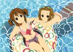  afloat alternate_hairstyle artist_request bikini bikini_skirt breasts cleavage frilled_bikini frills from_above goggles goggles_on_head highres hirasawa_yui innertube k-on! light_smile looking_at_viewer looking_up medium_breasts multiple_girls navel official_art pink_bikini scan short_twintails striped striped_bikini striped_swimsuit swimsuit tainaka_ritsu twintails water 