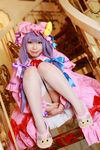  1girl asian cosplay crescent dress female hat long_hair patchouli_knowledge photo purple_hair solo stairs tenshi_myu touhou 