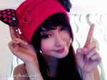  alodia alodia_gosiengfiao cosplay hat long_hair lowres smile solo 