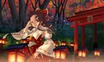  ascot autumn bow brown_eyes brown_hair detached_sleeves forest hair_bow hair_tubes hakurei_reimu kinoto_(ruindivinity) leaf maple_leaf nature solo stone_lantern torii touhou wide_sleeves 