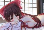  ass bare_shoulders blush bow breast_press breasts brown_hair butt_crack commentary detached_sleeves hair_bow hair_tubes hakurei_reimu highres large_breasts long_hair looking_at_viewer lying no_bra on_stomach red_eyes sideboob solo sweat tenchou_no_matsumoto touhou 