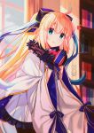  1girl absurdres ahoge aro_1801 black_gloves blonde_hair blue_eyes bookshelf box cape fate/grand_order fate_(series) fur-trimmed_cape fur_trim gloves heart heart-shaped_box highres long_hair ponytail smile tonelico_(fate) tonelico_(second_ascension)_(fate) wide_sleeves 