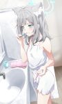  1girl animal_ear_fluff animal_ears blue_archive blue_eyes blush camisole closed_mouth collarbone cup extra_ears faucet fingernails floor grey_hair highres holding holding_toothbrush indoors kuu_(user_gngs5284) medium_hair mismatched_pupils shiroko_(blue_archive) solo toothbrush white_camisole wolf_ears 