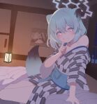  1girl animal_ears arm_support astra_chichi bath_yukata blue_archive blush breasts cleavage closed_mouth commentary eyelashes feet_out_of_frame finger_to_mouth futon green_hair hair_between_eyes hand_up highres index_finger_raised indoors japanese_clothes kimono long_sleeves looking_at_viewer medium_hair night pillow pink_eyes seductive_smile shigure_(blue_archive) shigure_(hot_spring)_(blue_archive) single_bare_shoulder sitting smile solo tail weasel_ears weasel_girl weasel_tail wide_sleeves yagasuri yokozuwari yukata 