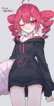  1girl ahoge alternate_costume baguette bare_shoulders black_hoodie blush bread drill_hair feet_out_of_frame food grey_background hair_between_eyes highres holding holding_pillow hood hoodie kasane_teto long_sleeves looking_at_viewer one_eye_closed open_mouth pillow red_eyes red_hair solo standing thinker25075754 twin_drills two-tone_hoodie utau 