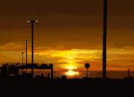  cityscape highres hisachan55cute horizon lamppost no_humans orange_clouds orange_sky original outdoors pixel_art road_sign scenery sign silhouette sky sunset town 
