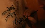  body_hair bodypaint creating_art dragon duo happy_trail human human_hands male mammal paint paintbrush pubes real ring skin 