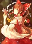  1girl ascot bigreen bow brown_eyes brown_hair chinese_commentary closed_mouth commentary_request cowboy_shot detached_sleeves frilled_bow frilled_hair_tubes frills gohei hair_bow hair_tubes hakurei_reimu highres holding holding_gohei holding_ofuda long_hair ofuda red_bow red_skirt ribbon-trimmed_sleeves ribbon_trim skirt skirt_set solo touhou yellow_ascot 