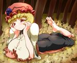  1girl aki_minoriko autumn barefoot blonde_hair breasts feet female forest hat highres histamine_c huge_breasts long_skirt lying nature on_stomach outdoors red_eyes short_hair skirt soles solo toes touhou 