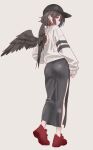  1girl alternate_costume alternate_headwear ass back_cutout baseball_cap black_hat black_skirt black_wings brown_hair closed_mouth clothing_cutout commentary_request contemporary earrings feathered_wings from_behind full_body grey_sweater hat highres jewelry long_skirt long_sleeves looking_at_viewer looking_back red_eyes red_shoes shameimaru_aya shoes side_slit simple_background skirt smile soara_shimomo solo sweater tassel tassel_earrings touhou wings 