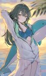  1girl arm_behind_head arm_up blurry blush breasts center_opening cleavage commentary_request depth_of_field feet_out_of_frame gakuen_idolmaster green_eyes green_hair hair_between_eyes highres idolmaster inflatable_dolphin inflatable_toy jacket long_hair looking_at_viewer medium_breasts ningen_mame open_mouth signature solo standing sunset swimsuit tsukimura_temari white_jacket 