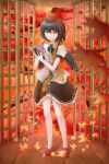  1girl absurdres black_hair black_ribbon black_skirt blurry blurry_foreground book closed_mouth frilled_skirt frills full_body hair_between_eyes hand_up hat highres holding holding_book leaf leaf_print looking_at_object maple_leaf maple_leaf_print neck_ribbon open_book red_eyes red_hat red_shoes ribbon shameimaru_aya shirt shoes short_hair skirt smile socks solo standing tokin_hat touhou white_shirt white_socks wooden_floor xiaoxiifff 