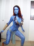  closet clothed clothing cosplay feathers female hair human inside james_cameron's_avatar loincloth mammal na'vi necklace photo real red_hair skimpy tribal 