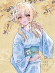  1girl alternate_costume blonde_hair blue_kimono blue_sash breasts commentary_request fingernails floral_print floral_print_kimono flower genshin_impact hair_between_eyes hair_flower hair_ornament hand_up highres japanese_clothes kimono looking_at_viewer lumine_(genshin_impact) medium_breasts obi open_mouth print_kimono sash short_hair_with_long_locks snow20200 solo twitter_username upper_body white_flower yellow_background yellow_eyes 