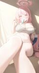  1girl absurdres against_wall blue_archive blush bra breasts cleavage commentary_request eimi_(blue_archive) food food_in_mouth halo hand_up highres indoors korean_commentary large_breasts long_hair looking_at_viewer melting_popsicle navel panties pink_eyes pink_hair pink_halo popsicle popsicle_in_mouth raised_inner_eyebrows shade sitting solo springrain_06 strap_pull underwear underwear_only white_bra white_panties 