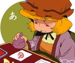  aki_minoriko blonde_hair failure food fruit grapes hat ink japanese_clothes mirror_writing onikobe_rin paper potato printing red_eyes short_hair sitting solo stamp touhou you're_doing_it_wrong 