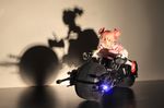  batman_(series) batpod bow crossover dress figure ground_vehicle hair_bow kaname_madoka mahou_shoujo_madoka_magica moonshine_animations motor_vehicle motorcycle photo pink_eyes pink_hair riding self_upload shadow shoes silhouette solo toy twintails white_legwear 