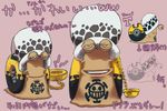  den_den_mushi hat jolly_roger multiple_views no_humans one_piece phone snail tattoo trafalgar_law x0x yellow_eyes 