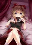  blonde_hair bloomers blue_eyes bow chocolate chocolate_bar dqn_(dqnww) eating frilled_pillow frills hair_bow highres lying medicine_melancholy midriff on_back on_bed pillow short_hair skirt solo touhou underwear 