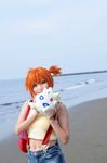  asian cosplay kasumi_(pokemon) kasumi_(pokemon)_(cosplay) nintendo orange_hair photo pokemon short_hair shorts suspenders togepi 