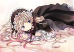  bad_id bad_pixiv_id blonde_hair blue_eyes dress frills gosick gothic_lolita hairband light_smile lolita_fashion long_hair looking_at_viewer lying on_stomach ribbon solo tooda_riko tsurime very_long_hair victorica_de_blois 